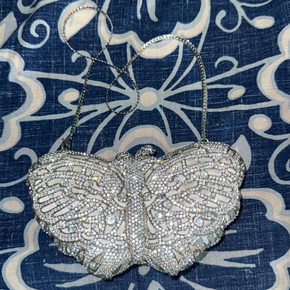 Silver butterfly clutch